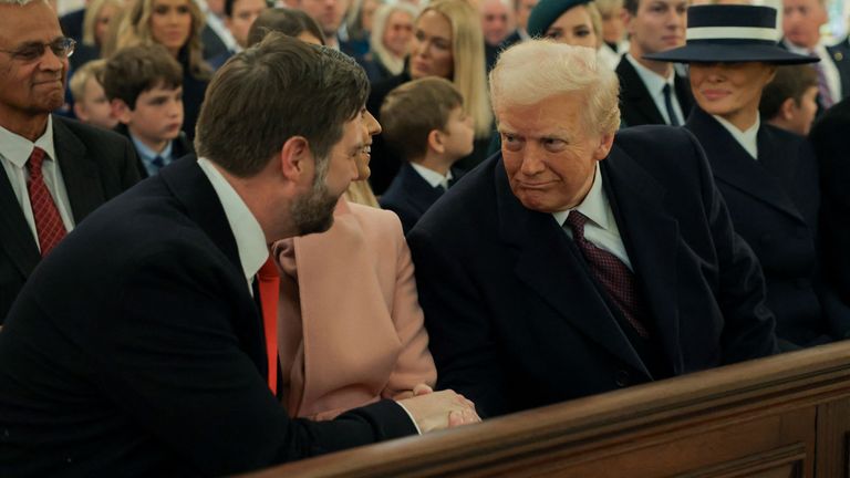 Donald Trump greets his vice president JD Vance at St John's Church. Pic: Reuters