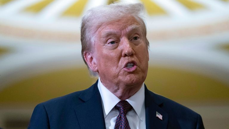 President-elect Donald Trump talks to reporters after a meeting with Republican leadership at the Capitol on Wednesday, Jan. 8, 2025, in Washington. (AP Photo/Jose Luis Magana)