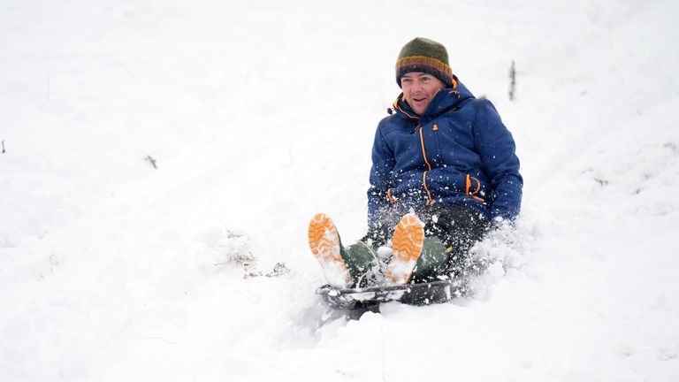 Stefan Meadley sledges in Studley Royal Park in North Yorkshire. Pic: PA