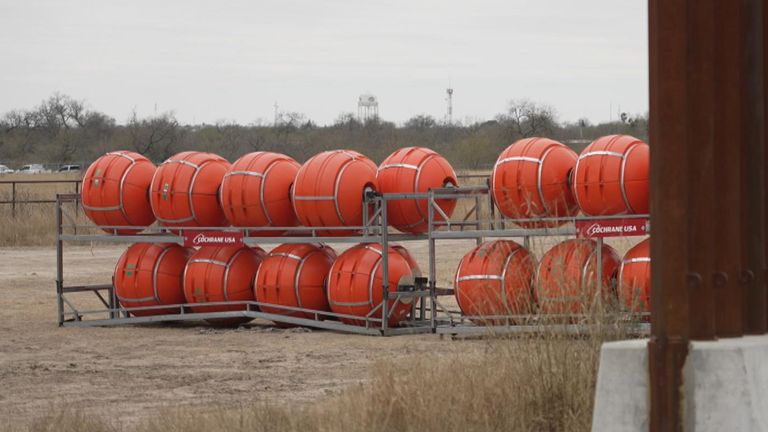 Buoys soon to be used to create a barrier across the Rio Grande River