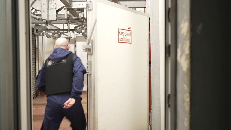 A Greater Manchester Police officer during the abattoir search