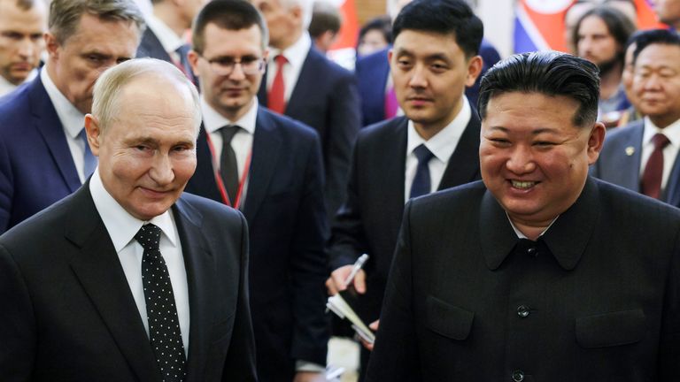 FILE - Russian President Vladimir Putin, left, and North Korea's leader Kim Jong Un smile together in Pyongyang, North Korea, on June 19, 2024. (Gavriil Grigorov, Sputnik, Kremlin Photo via AP, File)