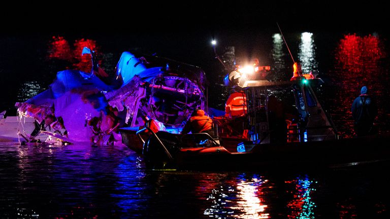 Pic: Andrew Harnik/Getty
ARLINGTON, VIRGINIA - JANUARY 30: (EDITORS NOTE: Image contains graphic content) Emergency response teams including Washington, DC Fire and EMS, DC Police and others, assess airplane wreckage in the Potomac River near Ronald Reagan Washington Airport on January 30, 2025 in Arlington, Virginia. An American Airlines flight from Wichita, Kansas collided with a helicopter while approaching Ronald Reagan National Airport. (Photo by Andrew Harnik/Getty Images)