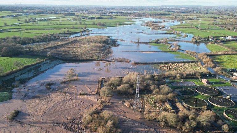 An aerial drone shot of a breached canal near Altrincham following heavy rainfall in Greater Manchester. A three-day yellow warning for snow has been issued for almost all of England and Wales and parts of Scotland this weekend as the Met Office warned that rural communities could become cut off. Picture date: Thursday January 2, 2025.

