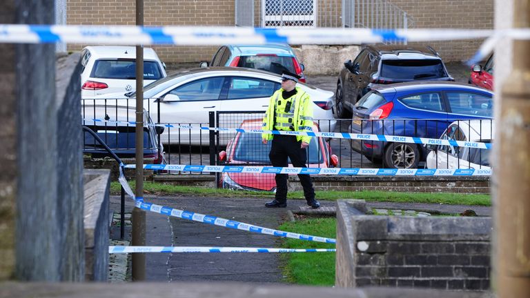 A police cordon at the scene on Harburn Drive, West Calder, after the deaths of a 36-year-old man and a six-year-old girl whose bodies were found at a property in West Lothian. Police said the deaths are being treated as unexplained and post-mortem examinations will take place in due course. Picture date: Tuesday January 21, 2025. PA Photo. See PA story POLICE WestCalder. Photo credit should read: Jane Barlow/PA Wire