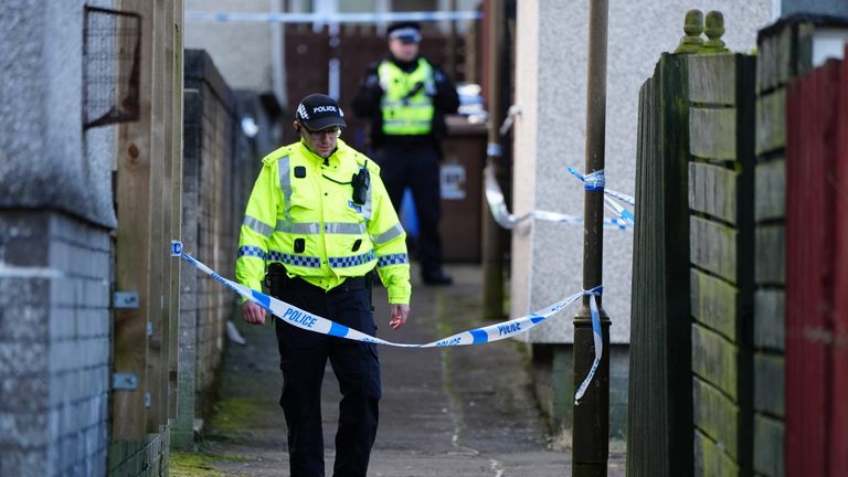 A police cordon at the scene on Harburn Drive, West Calder, after the deaths of a 36-year-old man and a six-year-old girl whose bodies were found at a property in West Lothian. Police said the deaths are being treated as unexplained and post-mortem examinations will take place in due course. Picture date: Tuesday January 21, 2025.