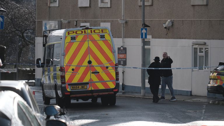 A police cordon on West Hoe Road in Plymouth, Devon, where a manhunt is under way for a male murder suspect after a woman in her 40s died having been found seriously injured in the street. The woman died in hospital during the early hours of Thursday having been attacked the night before in Plymouth. Picture date: Thursday January 23, 2025.
