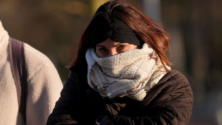 A woman braves the cold walking through Green Park in Central London. The UK Health Security Agency (UKHSA) has issued cold weather health alerts for all of England ahead of a week of low temperatures. Amber alerts have been issued from 12pm on Thursday until January 8, meaning a rise in deaths, particularly among those aged 65 and over or with health conditions, is likely, the UKHSA said. Picture date: Friday January 3, 2025.

