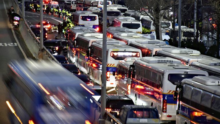 Many police vans are lined up in front of South Korean President Yoon Suk Yeol's official residence in Seoul on January 3, 2025.( The Yomiuri Shimbun via AP Images )