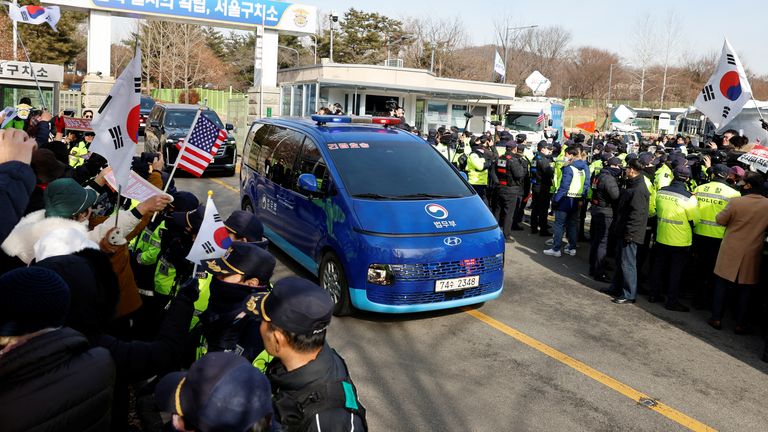 A motorcade believed to be carrying impeached President Yoon Suk Yeol leaves for court. Pic: Reuters