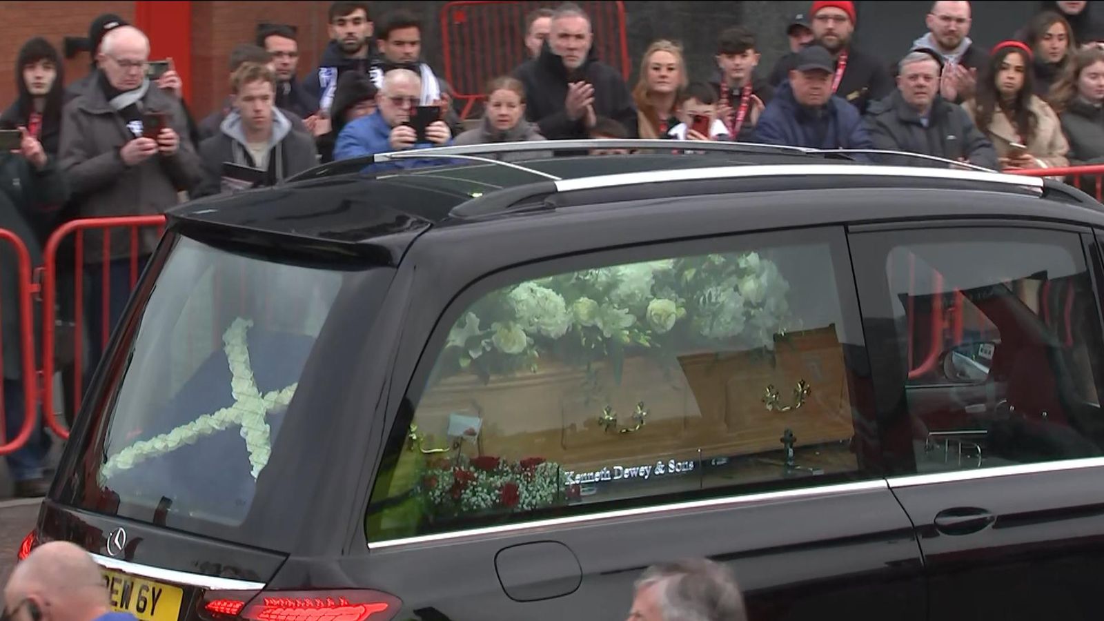 Denis Law funeral attracts thousands in Manchester