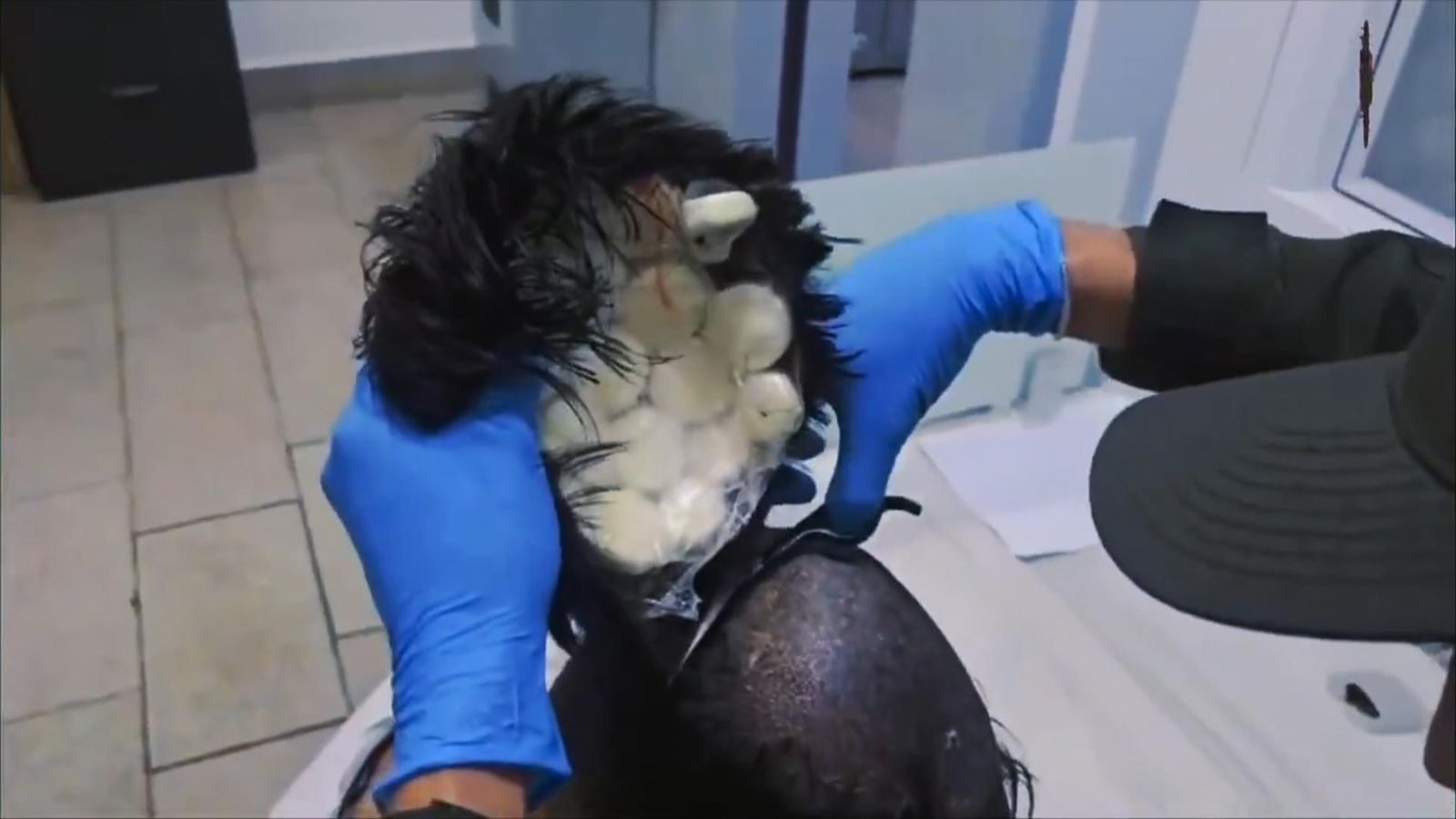 Man caught trying to smuggle cocaine under a wig in Colombia