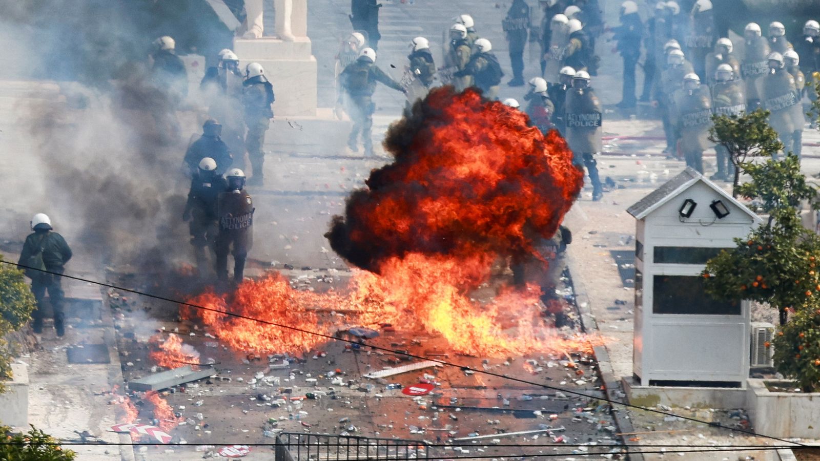 Police in Greece fire tear gas as protest marking deadly train crash anniversary turns violent