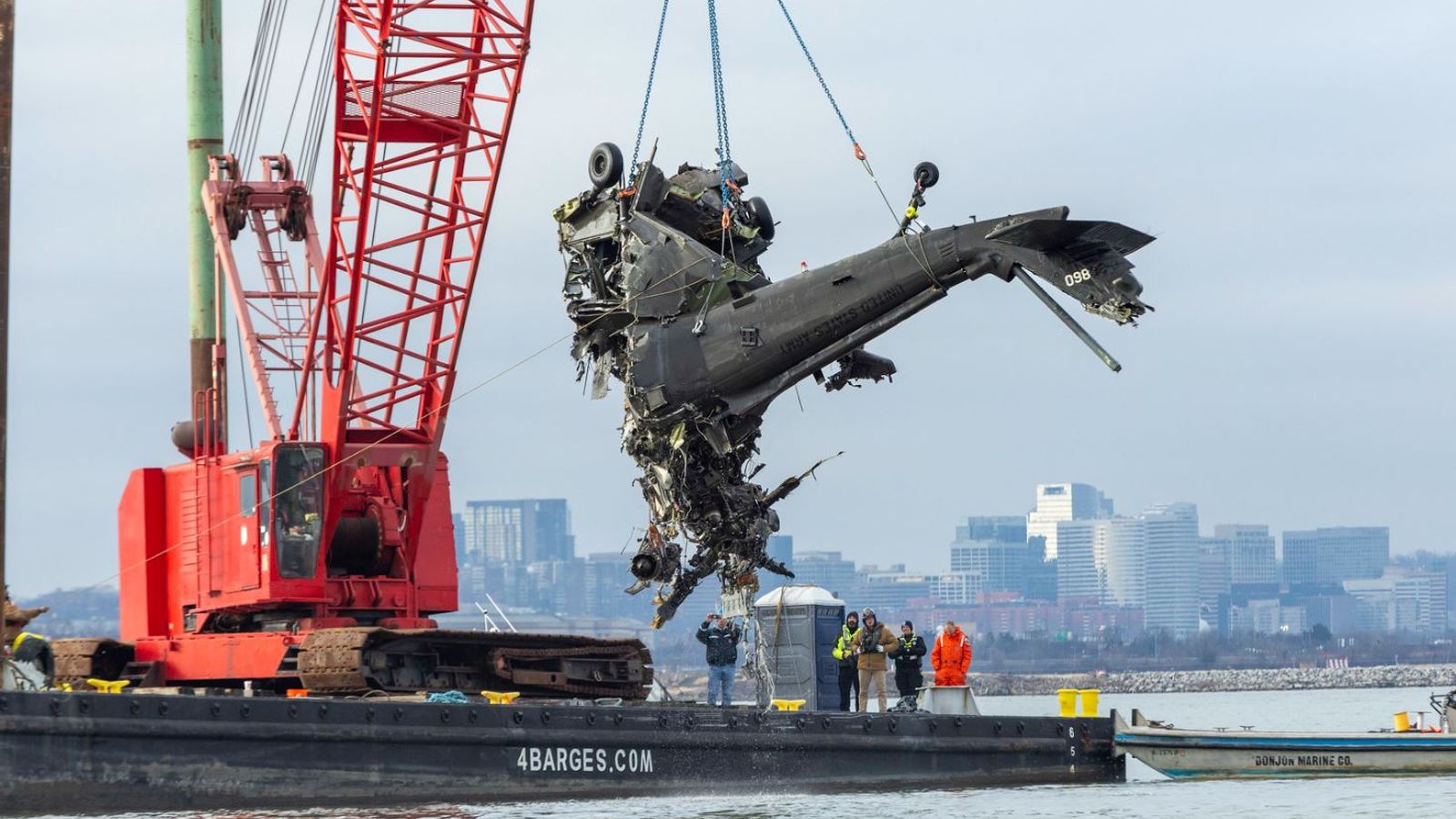 Helicopter flights at Washington's Reagan airport should be partially banned amid 'intolerable risk' of collisions with planes - investigators