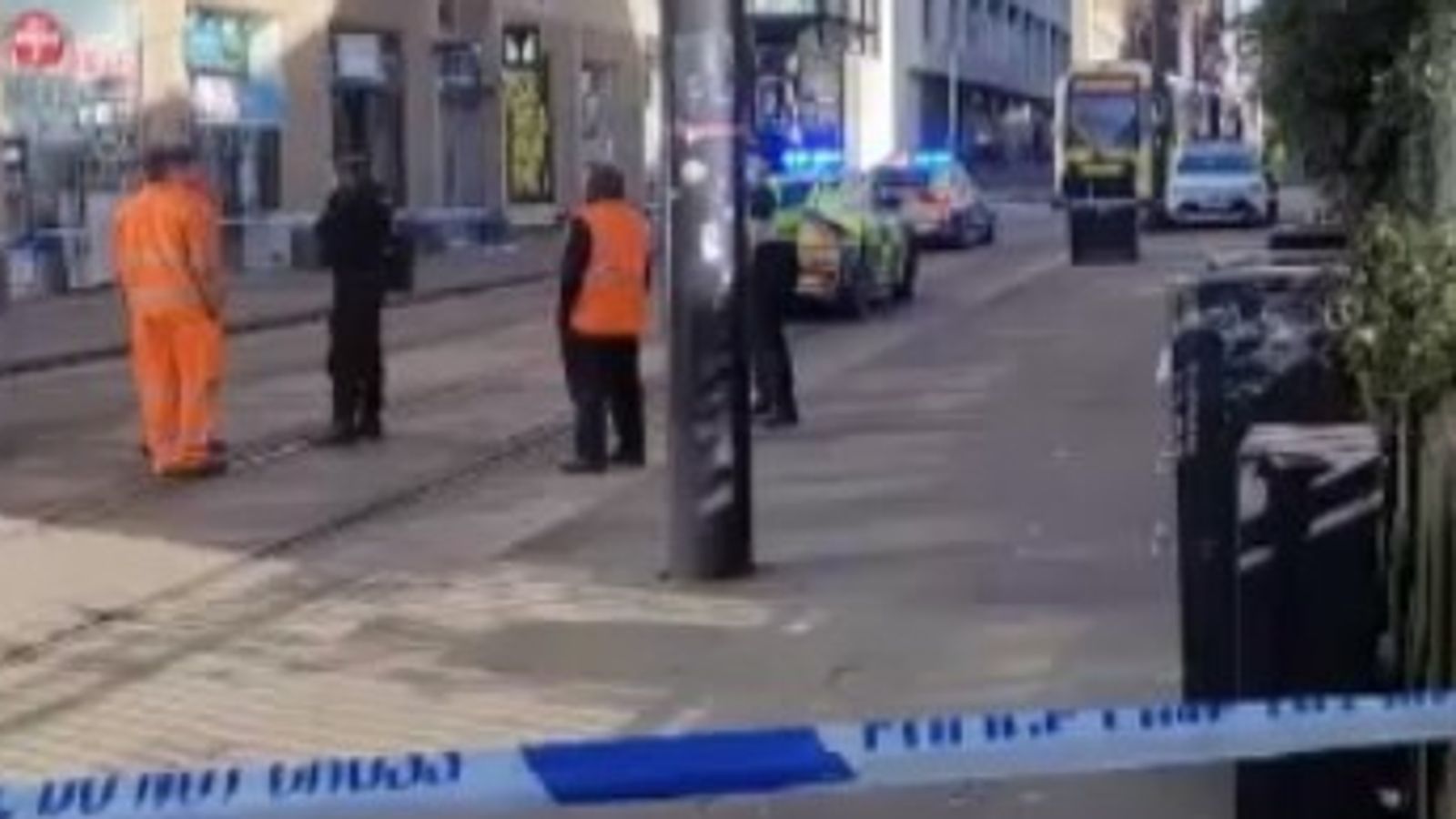 Police cordon off street after child killed after tram and van crash in ...