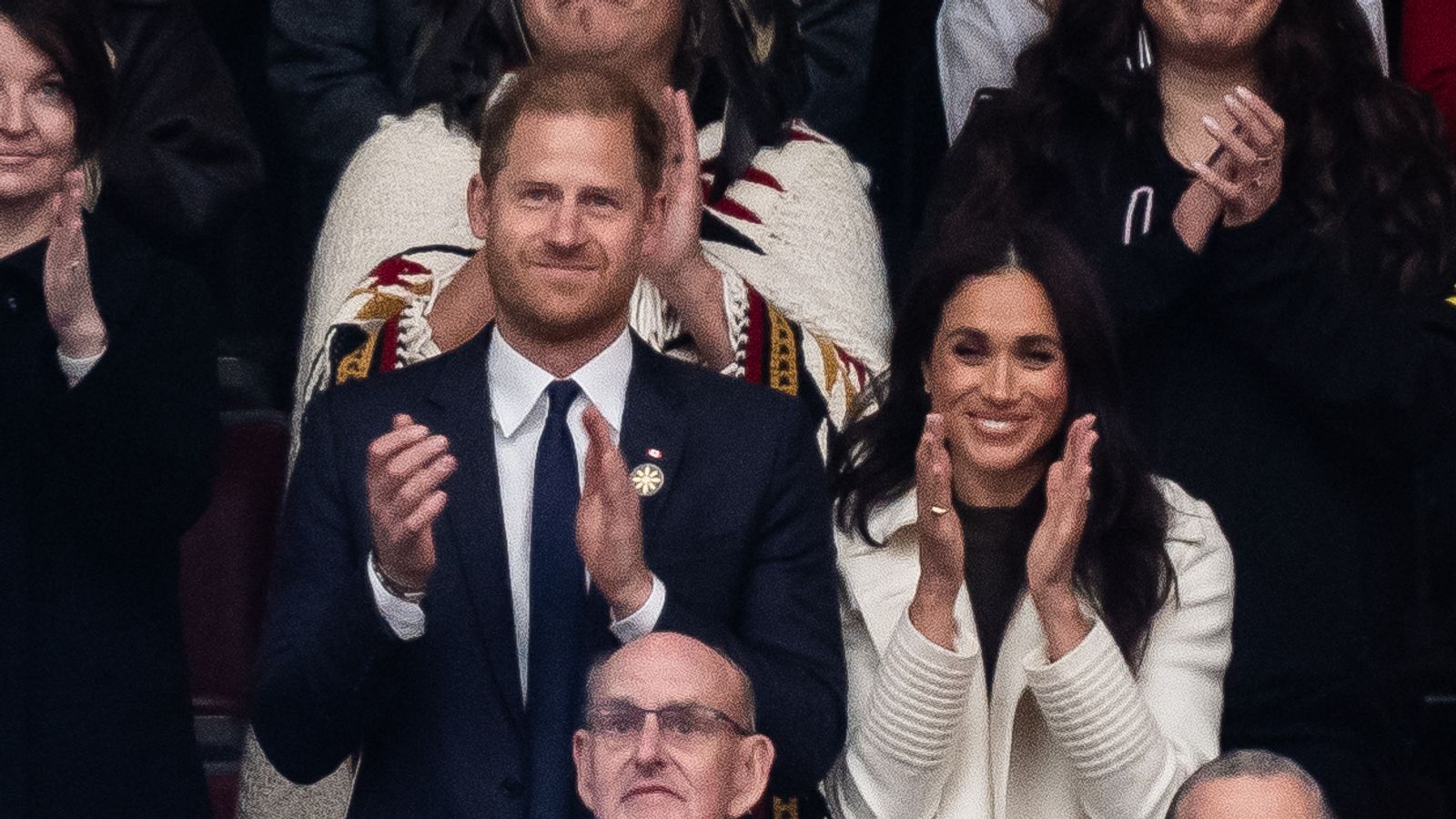 Prince Harry and Meghan cheer as Team UK walks onto Invictus Games opening ceremony stage