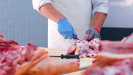 A butcher at work