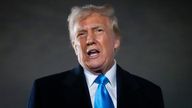President Donald Trump speaks to reporters next to Air Force One after arriving back at Joint Base Andrews, Md., Sunday, Feb. 2, 2025. (AP Photo/Ben Curtis)