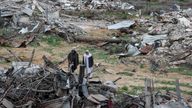 Palestinians view the destruction after Israeli forces withdrew from the Netzarim Corridor, amid a ceasefire between Israel and Hamas, near Gaza City, February 9, 2025. REUTERS/Dawoud Abu Alkas
