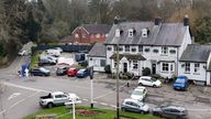 A police cordon at the Three Horseshoes pub in Knockholt, Sevenoaks in Kent, after emergency services were called just after 7pm on Friday amid reports a woman had suffered serious injuries. A male suspect fled the scene and is yet to be found. Picture date: Saturday February 15, 2025