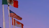 The flags of Mexico, the United States and Canada. Pic: Reuters
