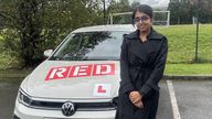 Driving instructor Anisa Fatima with her car