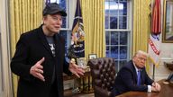 FILE PHOTO: Elon Musk speaks next to U.S. President Donald Trump in the Oval Office of the White House in Washington, D.C., U.S., February 11, 2025. REUTERS/Kevin Lamarque/File Photo