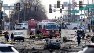 Investigators work the scene after a small plane crashed in Philadelphia, Saturday, Feb. 1, 2025. (AP Photo/Matt Rourke)
