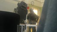 Armed police search the building. Pic: Andreas Sundling
