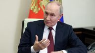 Russian President Vladimir Putin speaks with state TV Kremlin correspondent Pavel Zarubin at his residence outside Moscow, Russia, February 24, 2025. Sputnik/Mikhail Metzel/Pool via REUTERS ATTENTION EDITORS - THIS IMAGE WAS PROVIDED BY A THIRD PARTY.