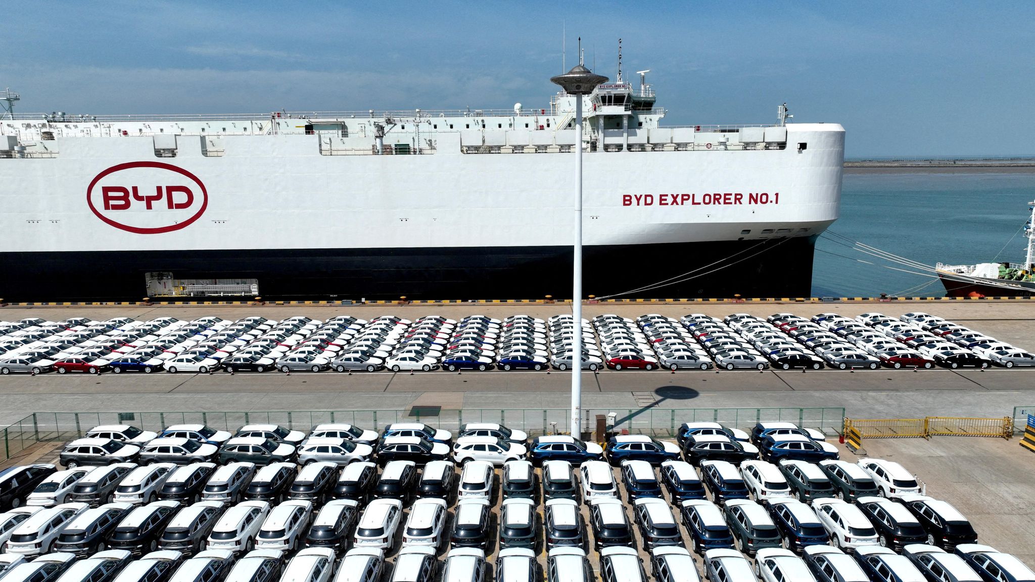 China hits back after new US tariffs take effect - as those against Mexico and Canada are paused | US News | Sky News