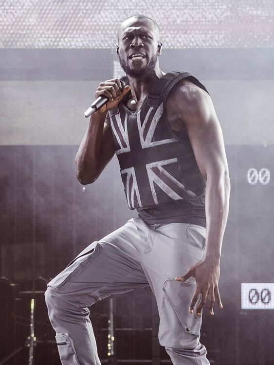 Rapper Stormzy performing at Glastonbury in 2019, wearing a bulletproof vest designed by Banksy. Pic: Joel C Ryan/Invision/AP                                                                                                                                                                                         