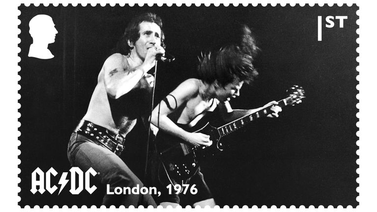 One of the eight stamps, this one showing Bon Scott and Angus Young performing in London in 1976.
Pic: PA