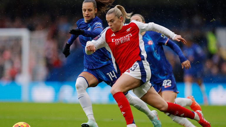 Arsenal's Alessia Russo and Chelsea's Nathalie Bjorn at Stamford Bridge in January. Pic: Action Images via Reuters/Andrew Couldridge