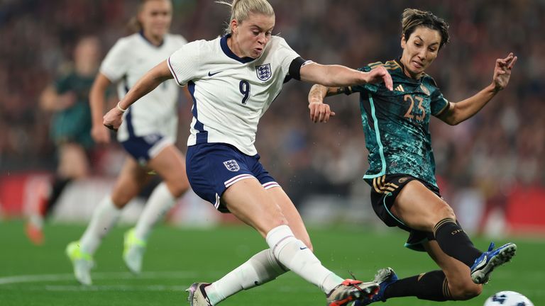 England's Alessia Russo and Sara Doorsoun-Khajeh of Germany during a match at Wembley last October. Pic: AP