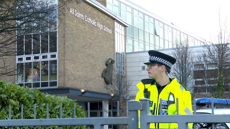 Police officers outside All Saints Catholic High School, on Granville Road in Sheffield.
Pic: PA  