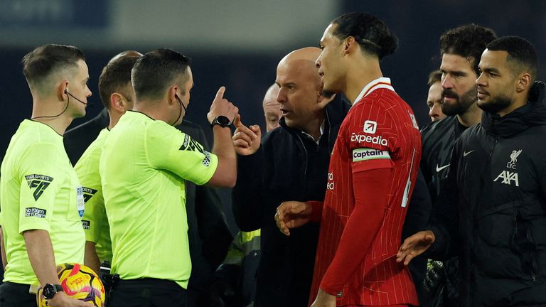 Arne Slot remonstrates with referee Michael Oliver after the match before being sent off. Pic: Reuters