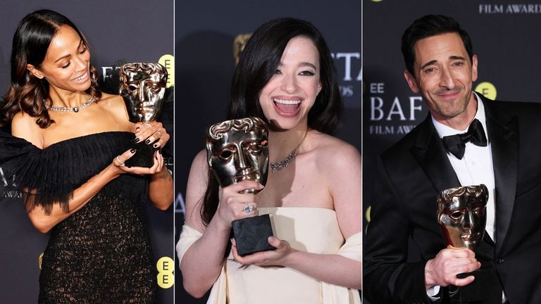 (L-R) Zoe Saldana, Mikey Madison and Adrien Brody after winning at the BAFTAs