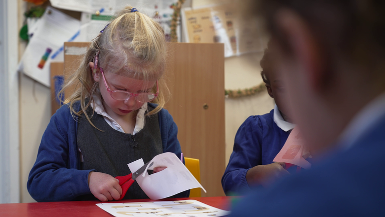 4-year-old Olive is ‘thriving’ at Heathlands, a specialist deaf school in St Albans.