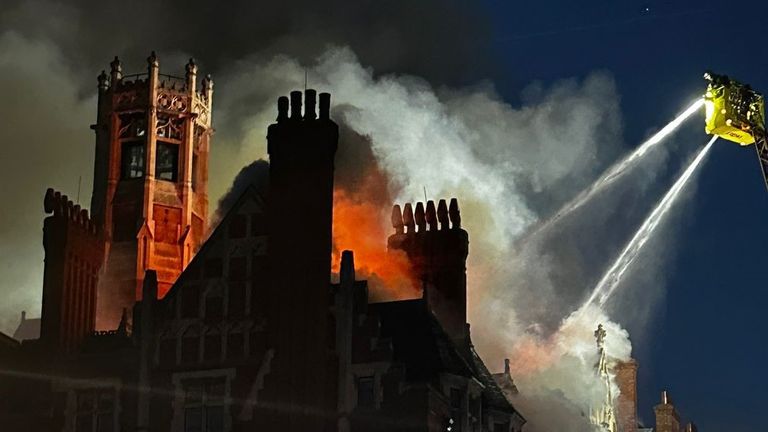 Firefighters tackle the fire from on high