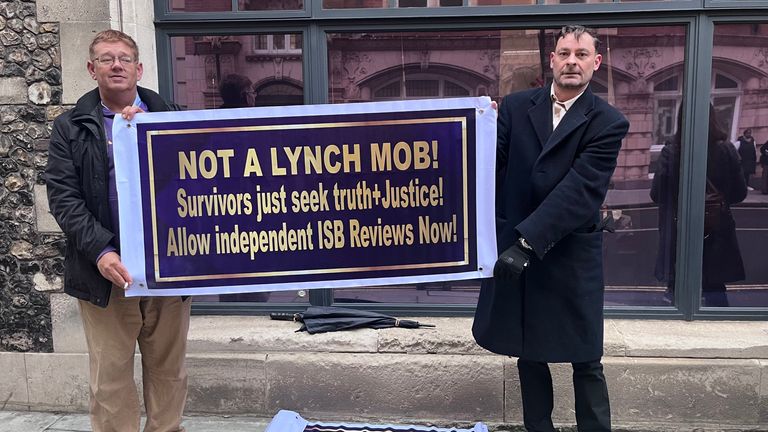 Abuse survivor Craig Freedman (right) outside Church House in London, where the vote took place. Pic: Aine Fox/PA Wire