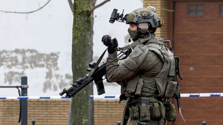 A police member works at the Clemenceau metro station, after a shooting took place in Brussels, Belgium.
Pic: Reuters