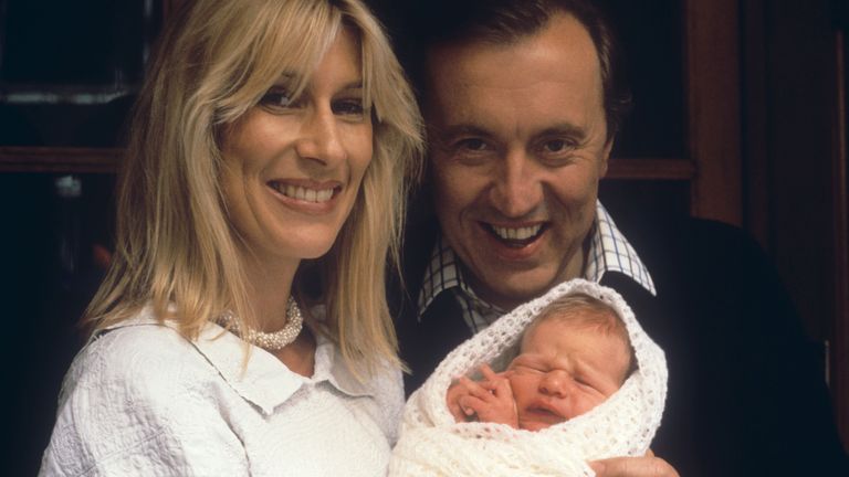 David Frost with his wife Lady Carina and Wilfred as they left St Mary's Hospital in Paddington. Pic: PA