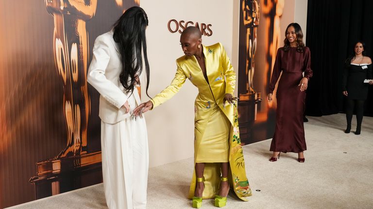 Demi Moore, from left, Cynthia Erivo, and Zoe Saldana at the Oscar nominees dinner. Pic: Jordan Strauss/Invision/AP