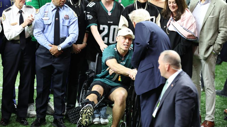 President Trump met relatives of the victims of the New Year's Day attack, as well as police and emergency personnel. Pic: Reuters