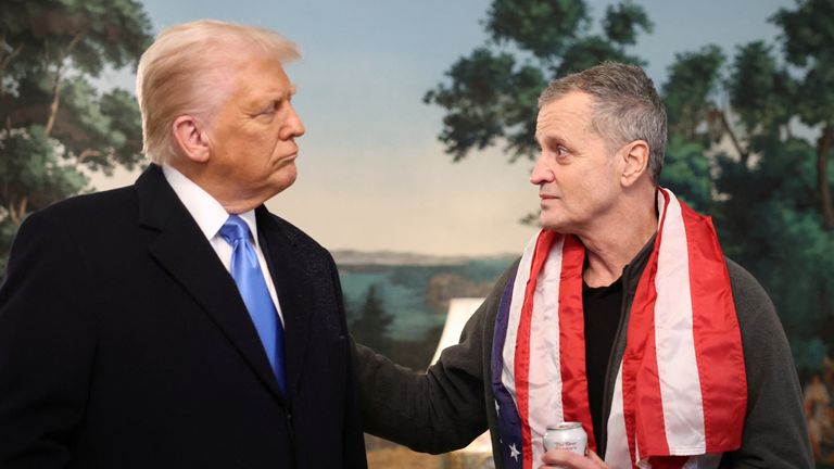 President Donald Trump and Marc Fogel in the White House and an event celebrating the teacher's release.
Pic: Reuters/Kevin Lamarque