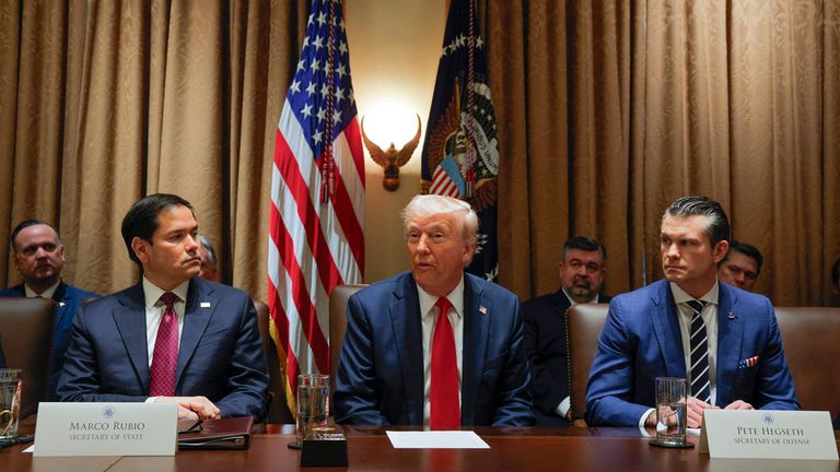 Donald Trump, centre, with Secretary of State Marco Rubio, left, and Defence Secretary Pete Hegseth, right. Pic: AP