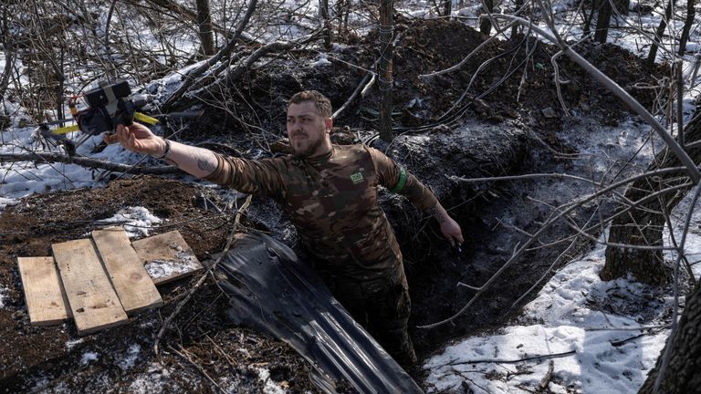 A serviceman of the 93rd Kholodnyi Yar Separate Mechanized Brigade of the Ukrainian Armed Forces launches a reconnaissance drone at his position on a front line, amid Russia's attack on Ukraine, near the town of Toretsk, Donetsk region, Ukraine, February 22, 2025. Iryna Rybakova/Press Service of the 93rd Kholodnyi Yar Separate Mechanized Brigade of the Ukrainian Armed Forces/Handout via REUTERS ATTENTION EDITORS - THIS IMAGE HAS BEEN SUPPLIED BY A THIRD PARTY.