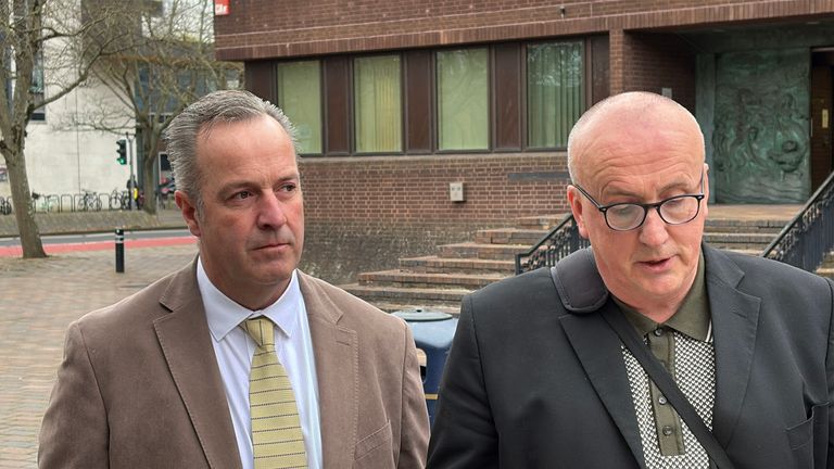 Retired PC Tim Bradshaw (left) and Andrew Newman, deputy chair of Sussex Police Federation, outside Portsmouth Crown Court
