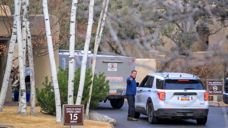 Santa Fe County Sheriff deputies arrive at the gated community where actor Gene Hackman and his wife Betsy Arakawa were found dead. Pic: AP